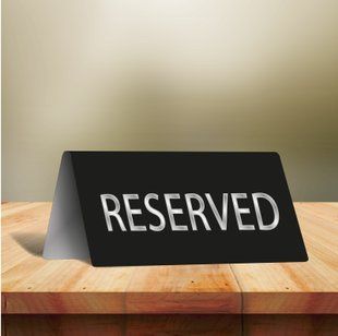 Табличка "Resеrved" 170х70мм из металла черного цвета двухсторонняя. DNM 1417 фото